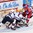 HELSINKI, FINLAND - JANUARY 4: Russia's Yegor Korshkov #26 gets the puck past USA's Alex Nedeljkovic #31 with Brandon Carlo #26 and Zach Werenski #13 in front during semifinal round action at the 2016 IIHF World Junior Championship. (Photo by Matt Zambonin/HHOF-IIHF Images)

